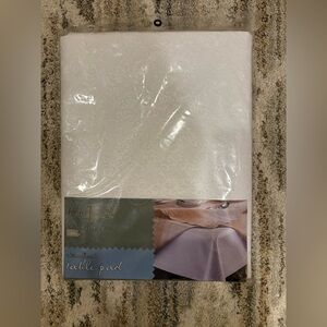 Home Trends White Embossed Table Pad.  Vinyl Face with a Polyester Flannel Back.